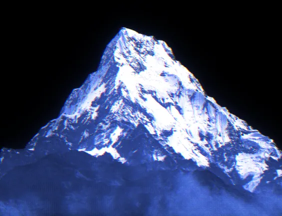 Snowy mountain with a blue tone in a winter landscape